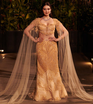 Champagne gold mermaid lehenga set hitch with detachable cape