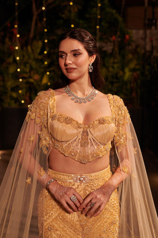 Champagne gold mermaid lehenga set hitch with detachable cape