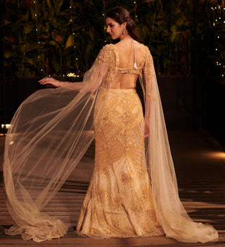 Champagne gold mermaid lehenga set hitch with detachable cape