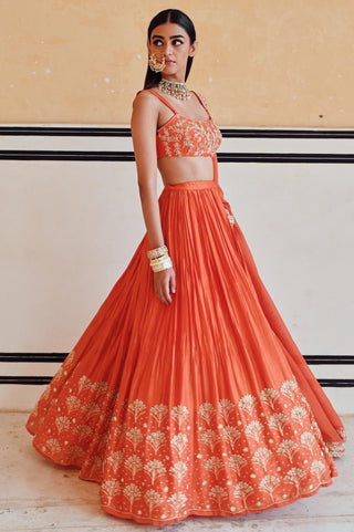 Orange rahi blouse with lehenga and dupatta