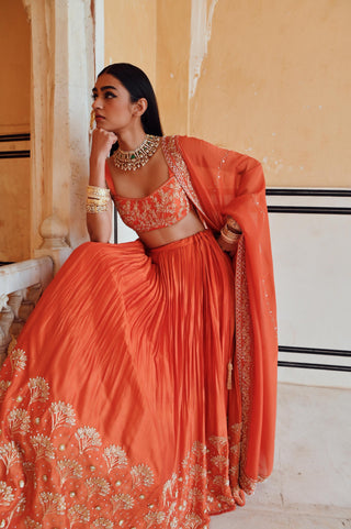 Orange rahi blouse with lehenga and dupatta