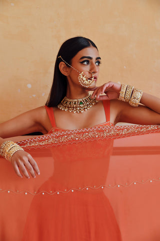 Orange rahi blouse with lehenga and dupatta