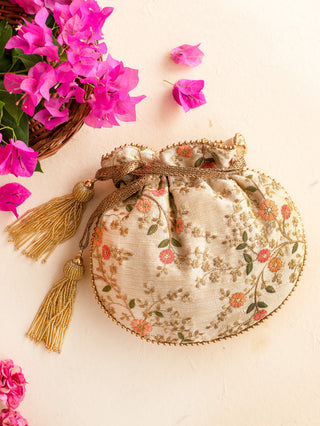 Beige floral creeper cream potli bag