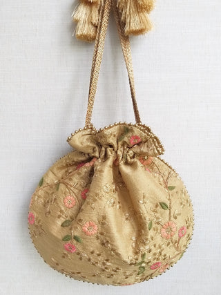 Gold floral creeper potli bag