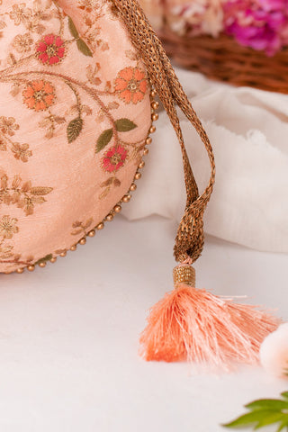 Peach floral creeper potli bag