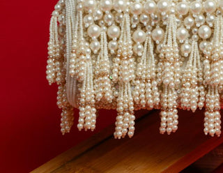 White gilt kasse bag