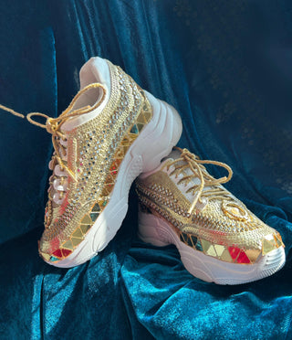 Egyptian-Inspired gold mirror sneakers