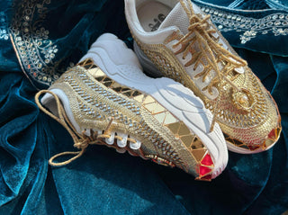 Egyptian-Inspired gold mirror sneakers