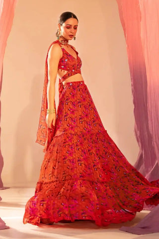 Rust orange printed tiered lehenga set