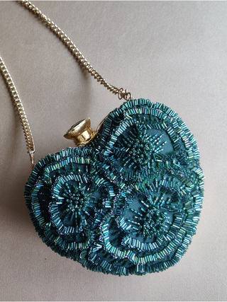 Green handcrafted heart clutch with detachable sling