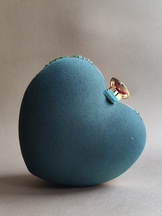 Green handcrafted heart clutch with detachable sling