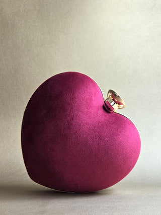 Red hand-embellished heart clutch with sling