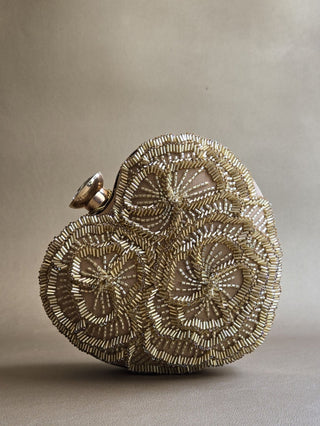 Gold hand-embellished heart clutch with sling