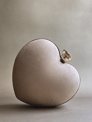 Gold hand-embellished heart clutch with sling