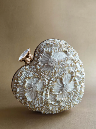 White handcrafted heart clutch with detachable sling