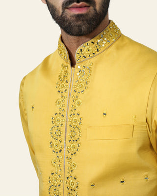Yellow nehru jacket with kurta and pyjama