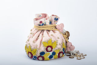 Pink bright thread work potli clutch