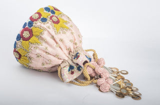 Pink bright thread work potli clutch