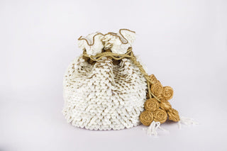 White embossed sequin potli