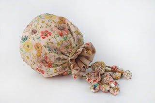 Blush pink floral embroidered potli