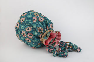 Green fort-inspired kamal print potli