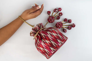 Red classic ikkat print potli