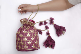 Purple leaf buta potli with dori & gota