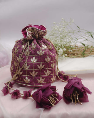 Purple leaf buta potli with dori & gota