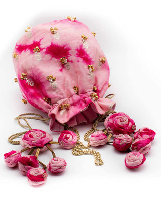 Hot pink shibori potli with zari
