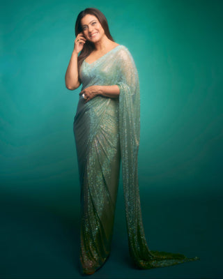 Green gleaming jewel saree set