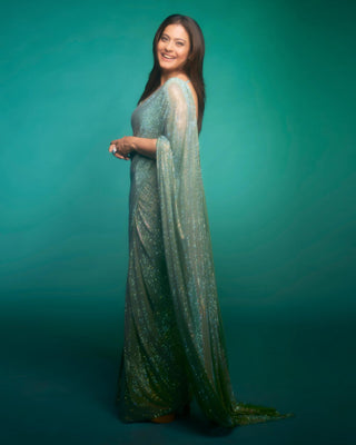 Green gleaming jewel saree set