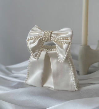 White satin bow bag