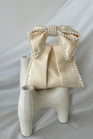 Ivory satin bow bag