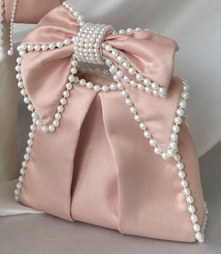 Blush satin bow bag