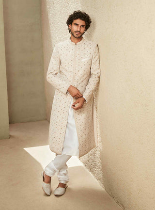Off-white raw silk sherwani and kurta set