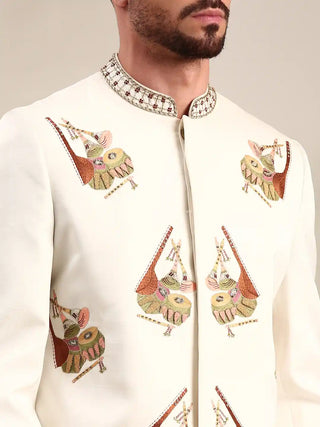 Ivory embroidered sherwani and churidar