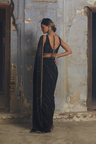 Black nihaar abstract beadwork saree set by Nitika Gujral at Mrs. G