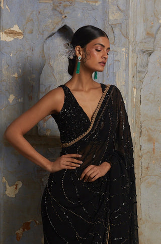 Black nihaar abstract beadwork saree set by Nitika Gujral at Mrs. G