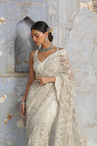 Ivory nihaar dori crystal saree set by Nitika Gujral at Mrs. G