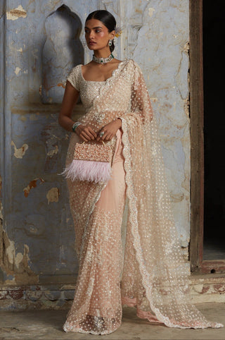 Pink nihaar ivory beadwork saree set by Nitika Gujral at Mrs. G