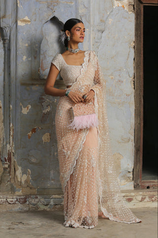 Pink nihaar ivory beadwork saree set by Nitika Gujral at Mrs. G