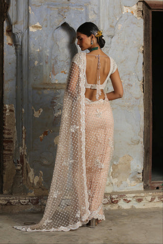 Pink nihaar ivory beadwork saree set by Nitika Gujral at Mrs. G