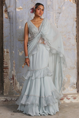 Blue nihaar shimmer georgette saree set by Nitika Gujral at Mrs. G