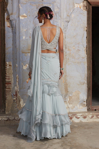 Blue nihaar shimmer georgette saree set by Nitika Gujral at Mrs. G