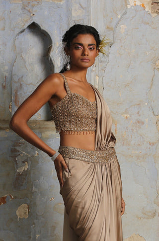 Brown nihaar crystal stone draped saree set by Nitika Gujral at Mrs. G