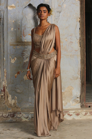 Brown nihaar crystal stone draped saree set by Nitika Gujral at Mrs. G