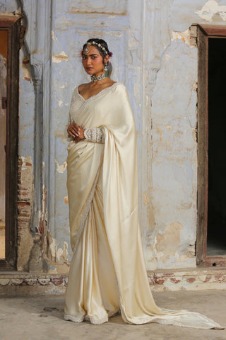 Ivory nihaar resham crystal saree set by Nitika Gujral at Mrs. G