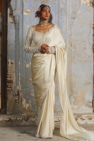 Ivory nihaar resham crystal saree set by Nitika Gujral at Mrs. G