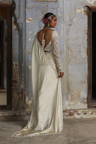 Ivory nihaar resham crystal saree set by Nitika Gujral at Mrs. G