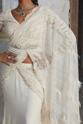 Ivory nihaar feather embellished saree set by Nitika Gujral at Mrs. G